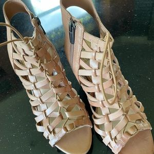 EEUC Vince Camuto ladies’ leather heel, open work shoes.